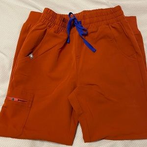 Burnt orange Zamora high waisted Zamora joggers. Size x-small petite